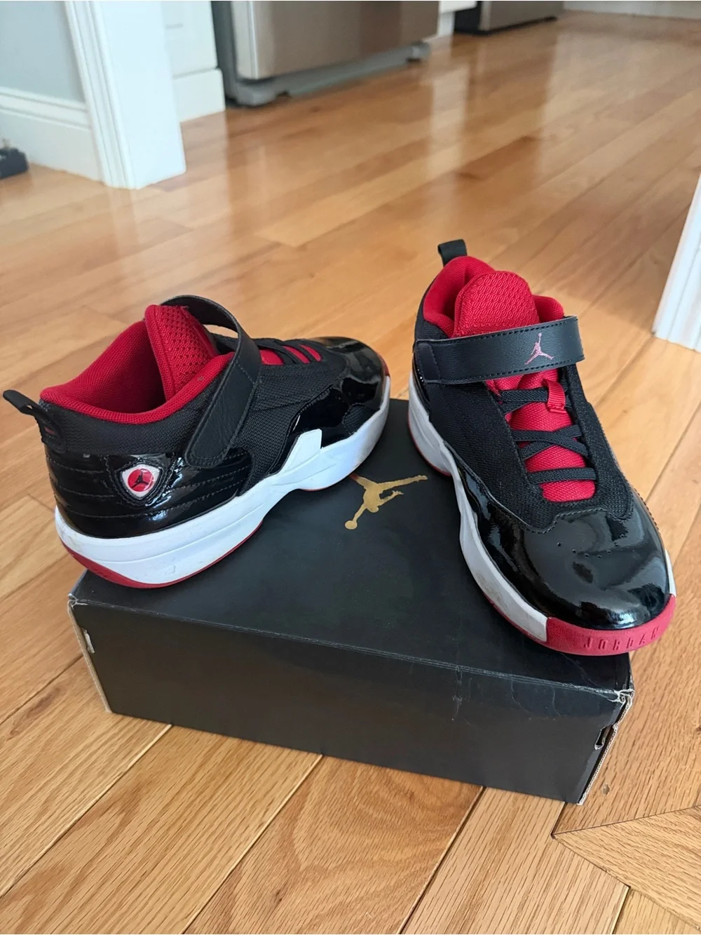 Jordan Kids Black and Red Low-Top Sneakers